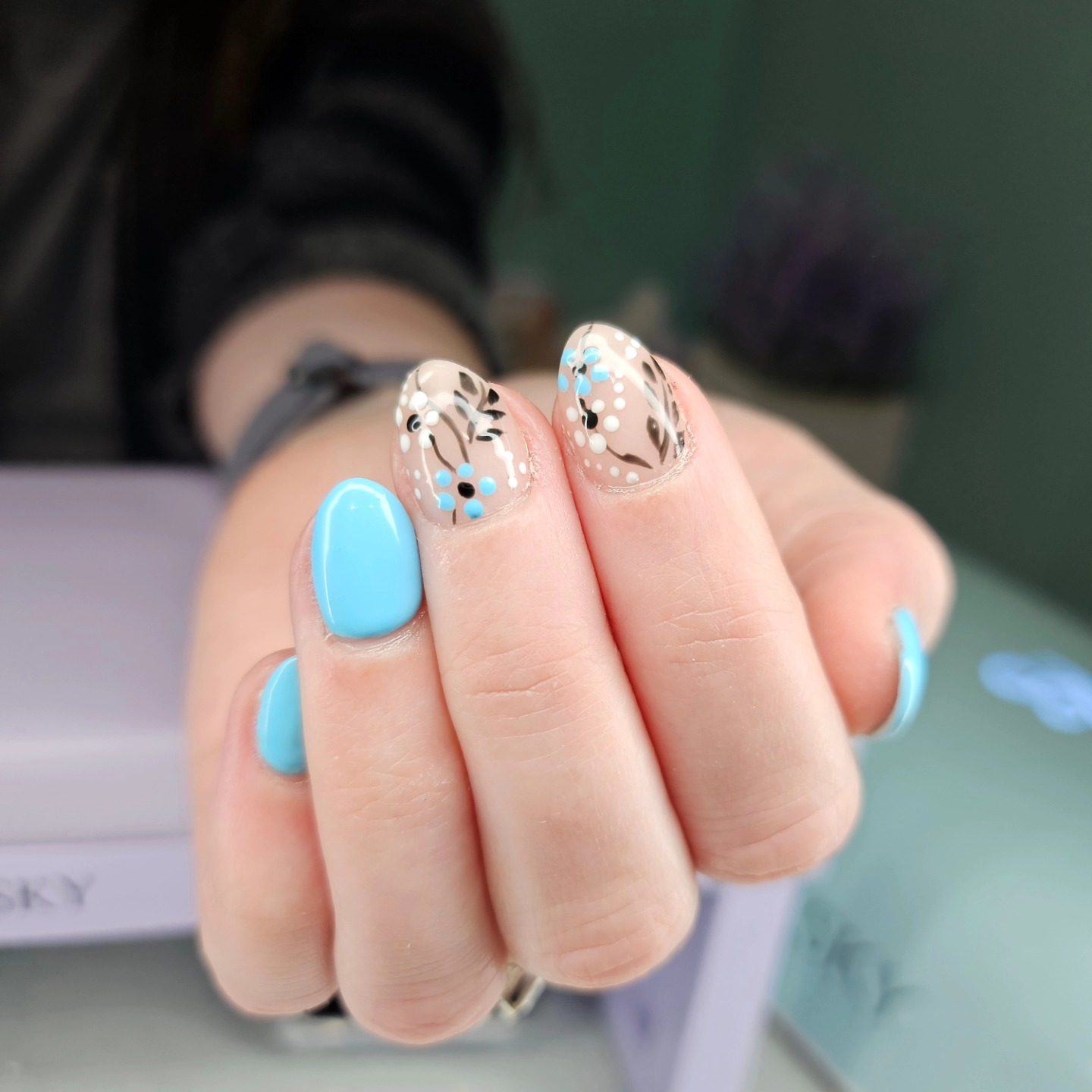Light blue with navy hand-painted branches