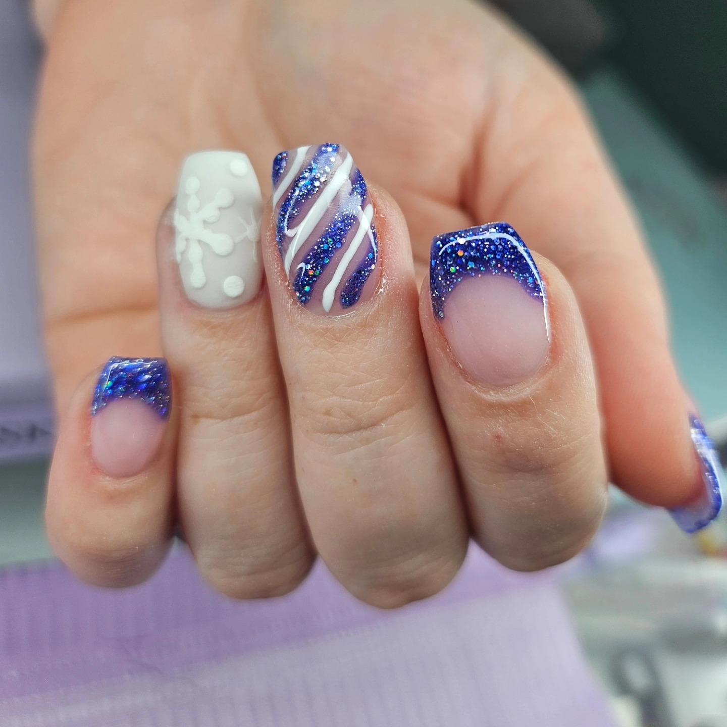 Blue glitter winter nails