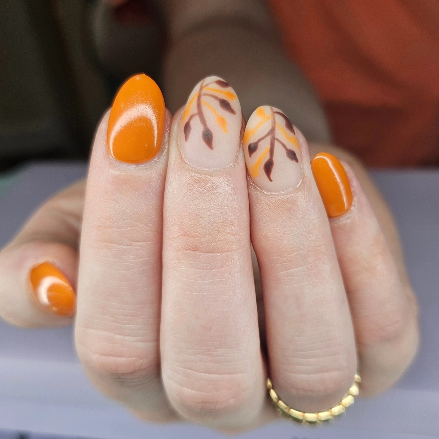 Orange with hand-painted fall leaf design