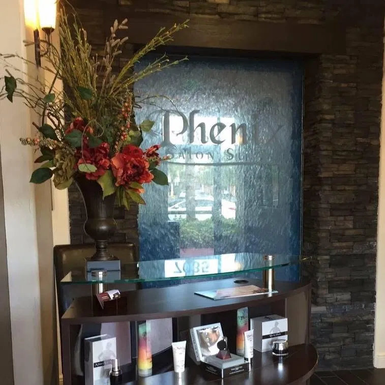 Phenix Salon Suites welcoming lobby with water wall